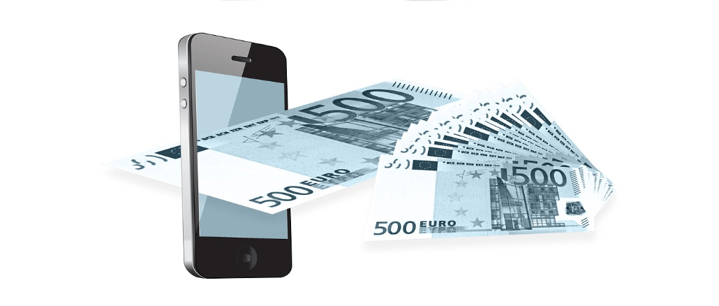 Smartphone Handy Geldschein Symbolbild